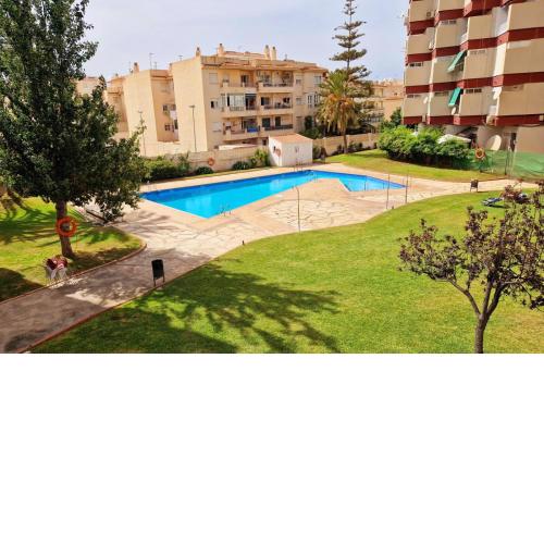 Luminoso apartamento Playa Torrecilla. Con Piscina