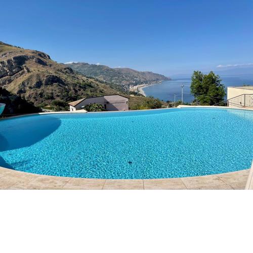 LUXURY APARTMENT TAORMINA WITH POOL AND PARKING