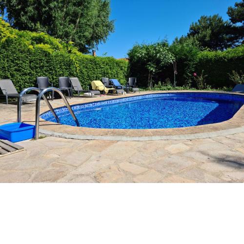 Luxury apartment with Swimming pool , Lovely Garden , BBQ place , Live Security