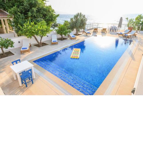 Luxury beach house, private pool, stunning sunsets, villa karpuz
