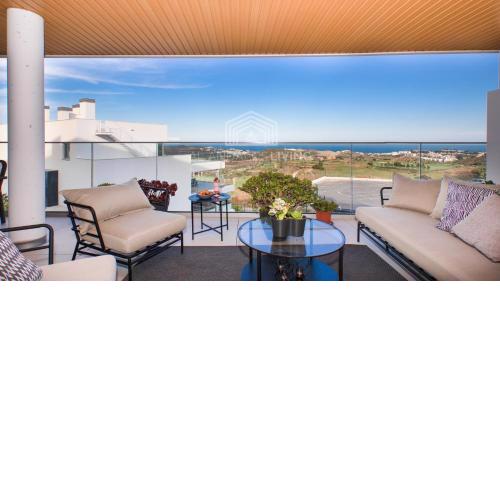 Luxury new built contemporary apartment with panoramic sea and golf view in upper La Cala de Mijas