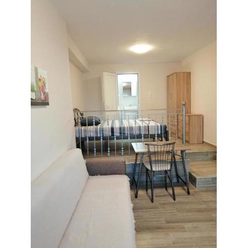 Marina's Apartments - White & Stone Apartment