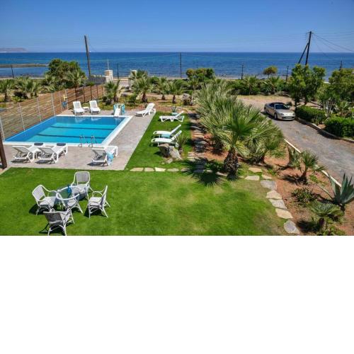 Mariza's Beachfront Apartment with Private Pool