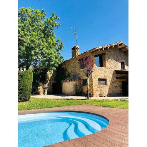 Masia with pool and beautiful views near Girona
