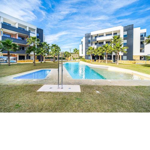 Modern apartment in Orihuela Costa with shared pool