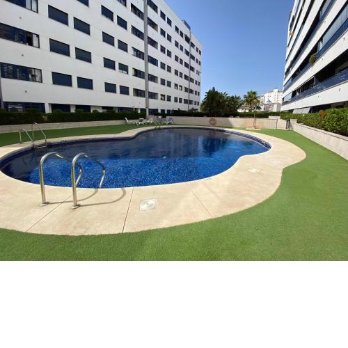 Modern apartment (terrace, swimming pool, garage)