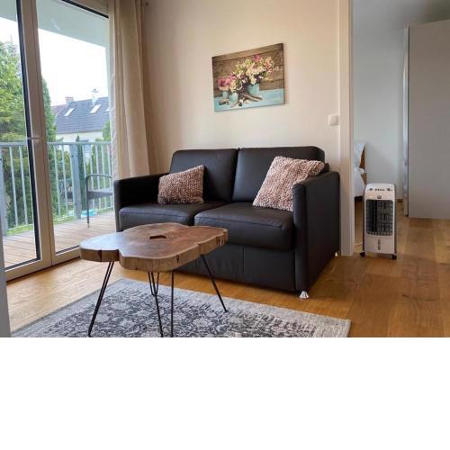 Modern apartment with private balcony near city center