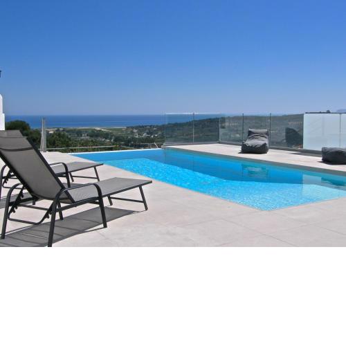 Modern villa with infinity pool close to the sea