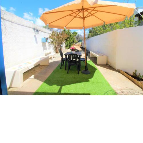 Monolocale nuovissimo con bellissimo patio esterno e giardino