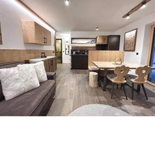 New eco-apart-chalet deluxe, private sauna, terrace 80sqm, garden 130sqm in "Carezza Dolomites" ski resort, 20 minutes from Bolzano