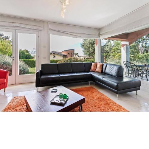 Nice apartment in a villa with three apartments with private porch and garden