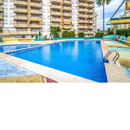 Nice apartment in Gandía with Outdoor swimming pool, WiFi and 3 Bedrooms