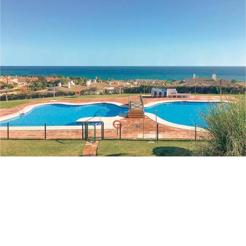 Nice apartment in Lnea de la Concepcin with 3 Bedrooms, WiFi and Outdoor swimming pool