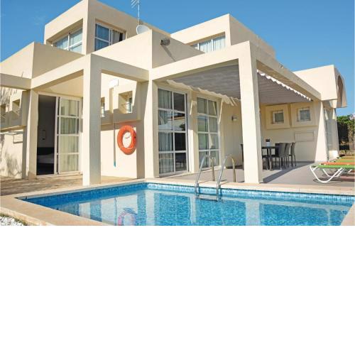 Nice home in Can Picafort with 4 Bedrooms, WiFi and Outdoor swimming pool