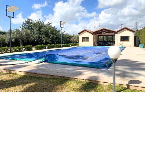 Nice home in Comiso with Outdoor swimming pool, WiFi and 3 Bedrooms