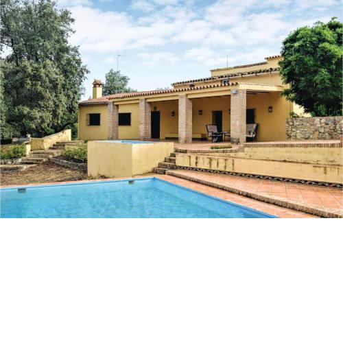 Nice home in Cortegana with 4 Bedrooms, Private swimming pool and Outdoor swimming pool