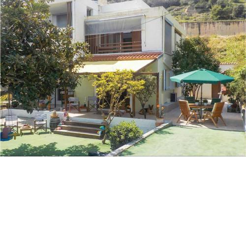 Nice home in Derveni with 5 Bedrooms and WiFi