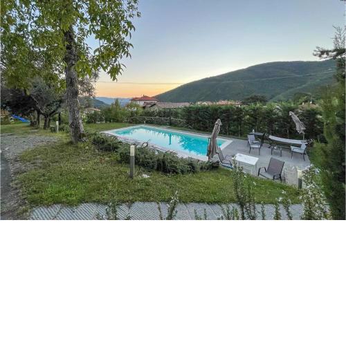 Nice home in Fivizzano with Outdoor swimming pool, WiFi and 7 Bedrooms