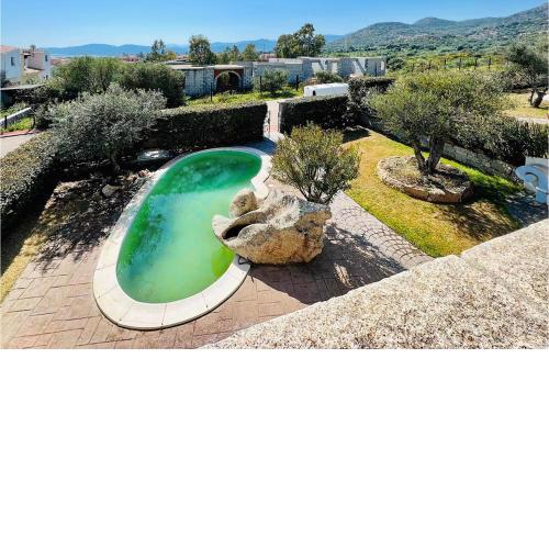 Nice home in Lu Fraile with Outdoor swimming pool and 4 Bedrooms