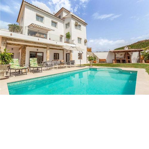 Nice Home In Mezquitilla With 4 Bedrooms, Wifi And Swimming Pool