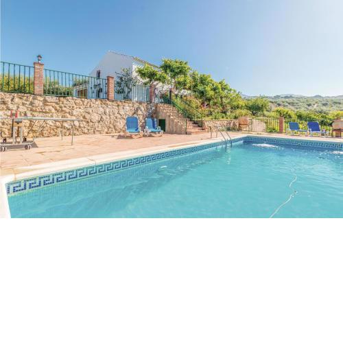 Nice home in Periana with 6 Bedrooms, Outdoor swimming pool and Swimming pool