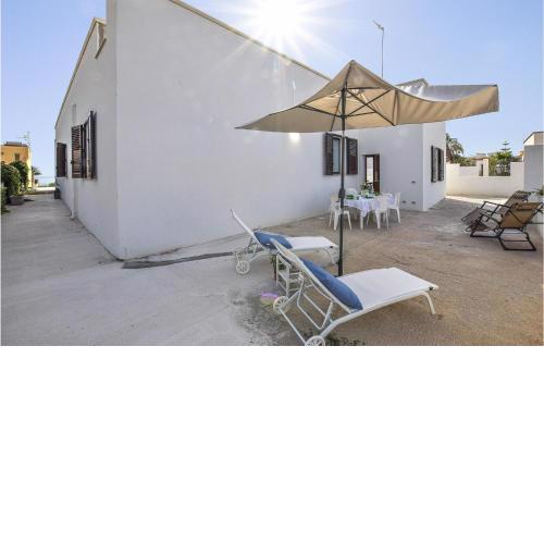 Nice home in Triscina with 3 Bedrooms and WiFi
