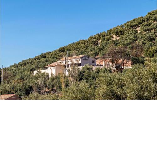 Nice home in Villanueva de Algaidas with Outdoor swimming pool, WiFi and 4 Bedrooms