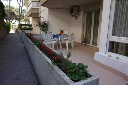 Nice renewed beachfront flat with patio on the ground floor