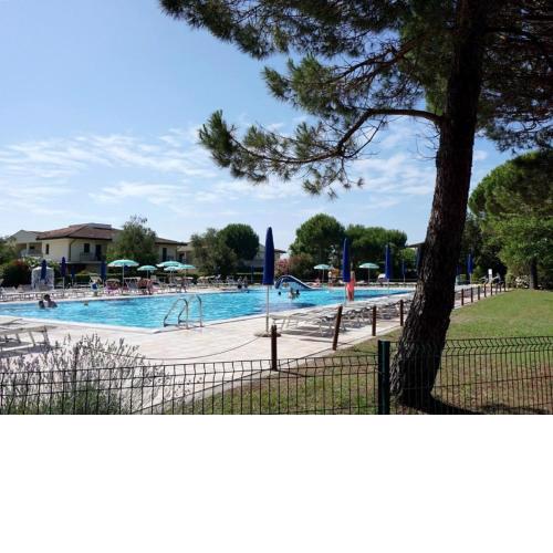 Nice villa in Caorle with shared pool