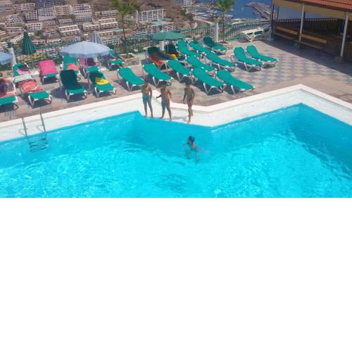 One bedroom appartement with sea view shared pool and furnished terrace at Mogan 1 km away from the beach