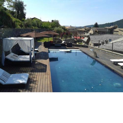 One bedroom house with shared pool sauna and enclosed garden at Boltana