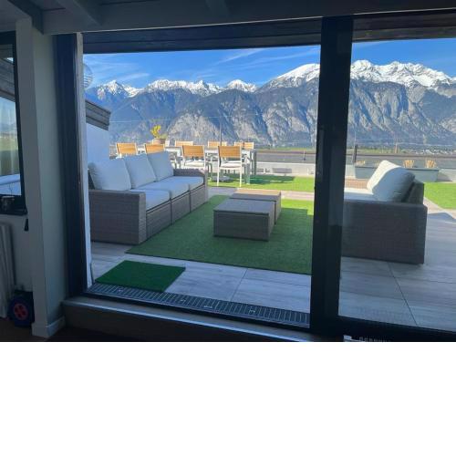Penthouse Axams spectacular views and large terrace