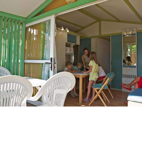 Pleasant chalet with a nice covered terrace, near the beach