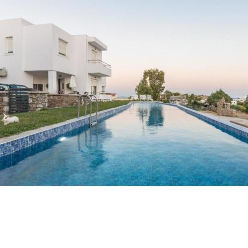 Posh Holiday Home in Gennadi with Shared Swimming Pool