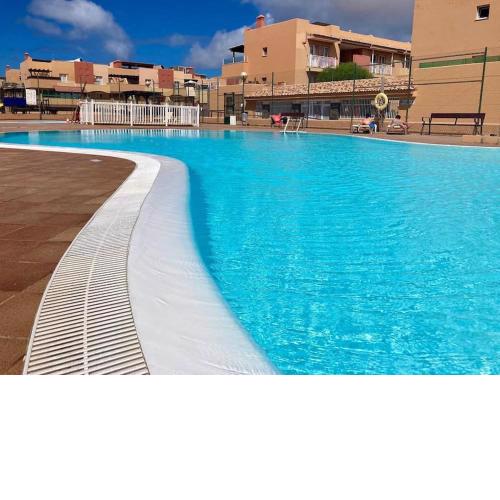 Precioso apto 4 pers, 2 piscinas, fibra óptica