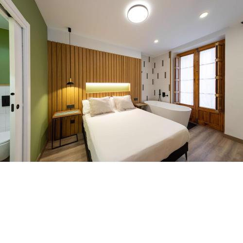 Precioso loft con bañera de isla