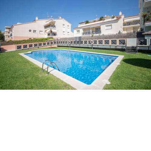 R129 Apartamento con terraza y piscina comunitaria cerca de la playa