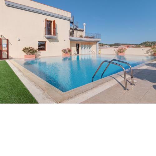 Residence con piscina a Villasimius
