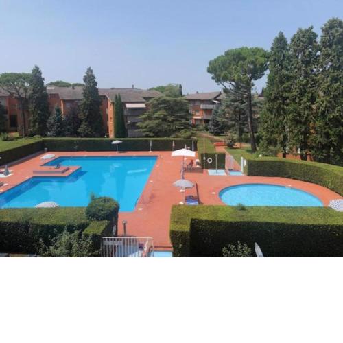 Residence with Pool - Two Bedroom Apartment with Balcony