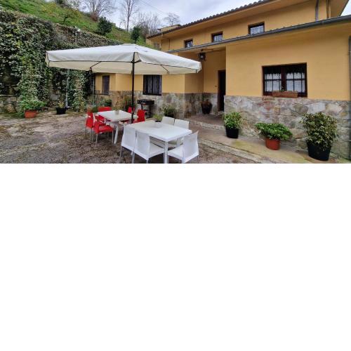 Río España - Casa amplia con patio y barbacoa en Villaviciosa