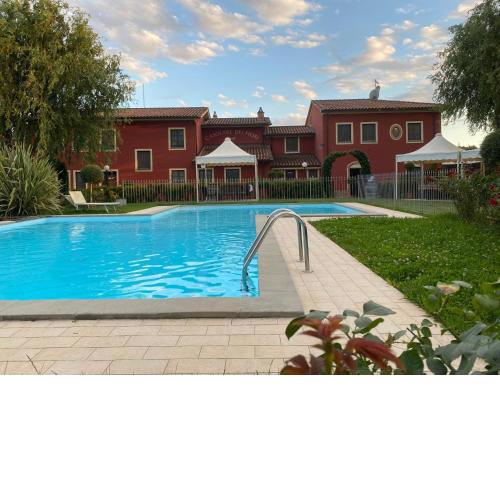 Room in Holiday house - Apartment in Farmhouse Casolare dei Fiori