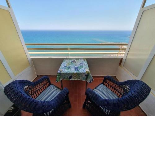 Seafront apartment with open-air heated pool