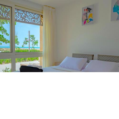 Seaview 3 BR with Beach & Pool access BBQ in Mangroovy