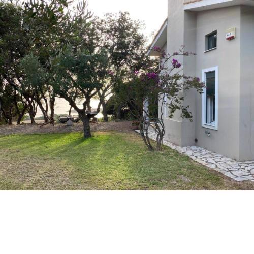 Secluded seaside villa w garden sea-sunset view