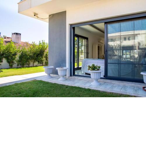 Sleek Villa with Private Pool and Garden in Cesme