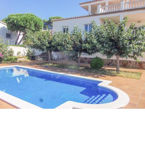 Spacious Holiday Home in L Escala with Swimming Pool