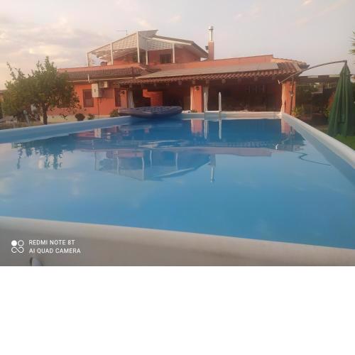 Stanza delle Muse in Villa con Piscina