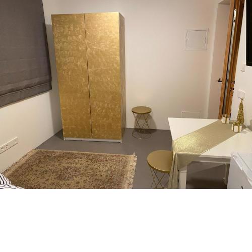 Stanza privata gold