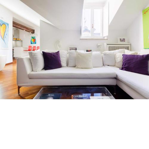 Stroll to the Duomo from a Plush Penthouse Apartment