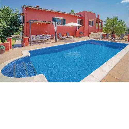 Stunning home in Port dAlcdia with WiFi, Outdoor swimming pool and Swimming pool